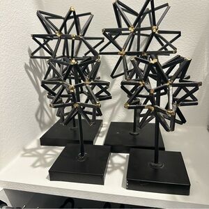 Black Star Sculptures with Gold Accents
